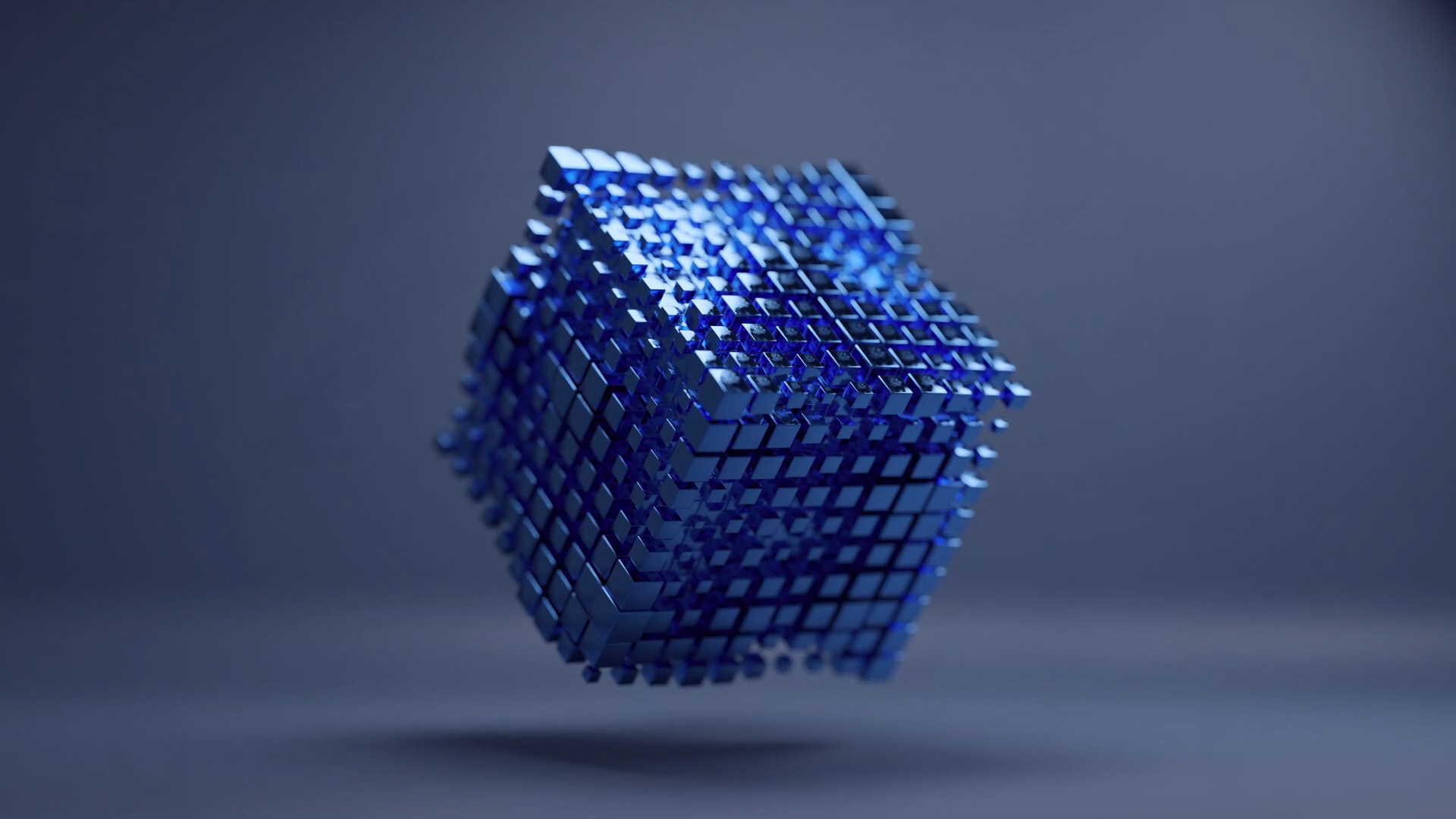 Rendering of a cube made up of many little metallic blue cubes