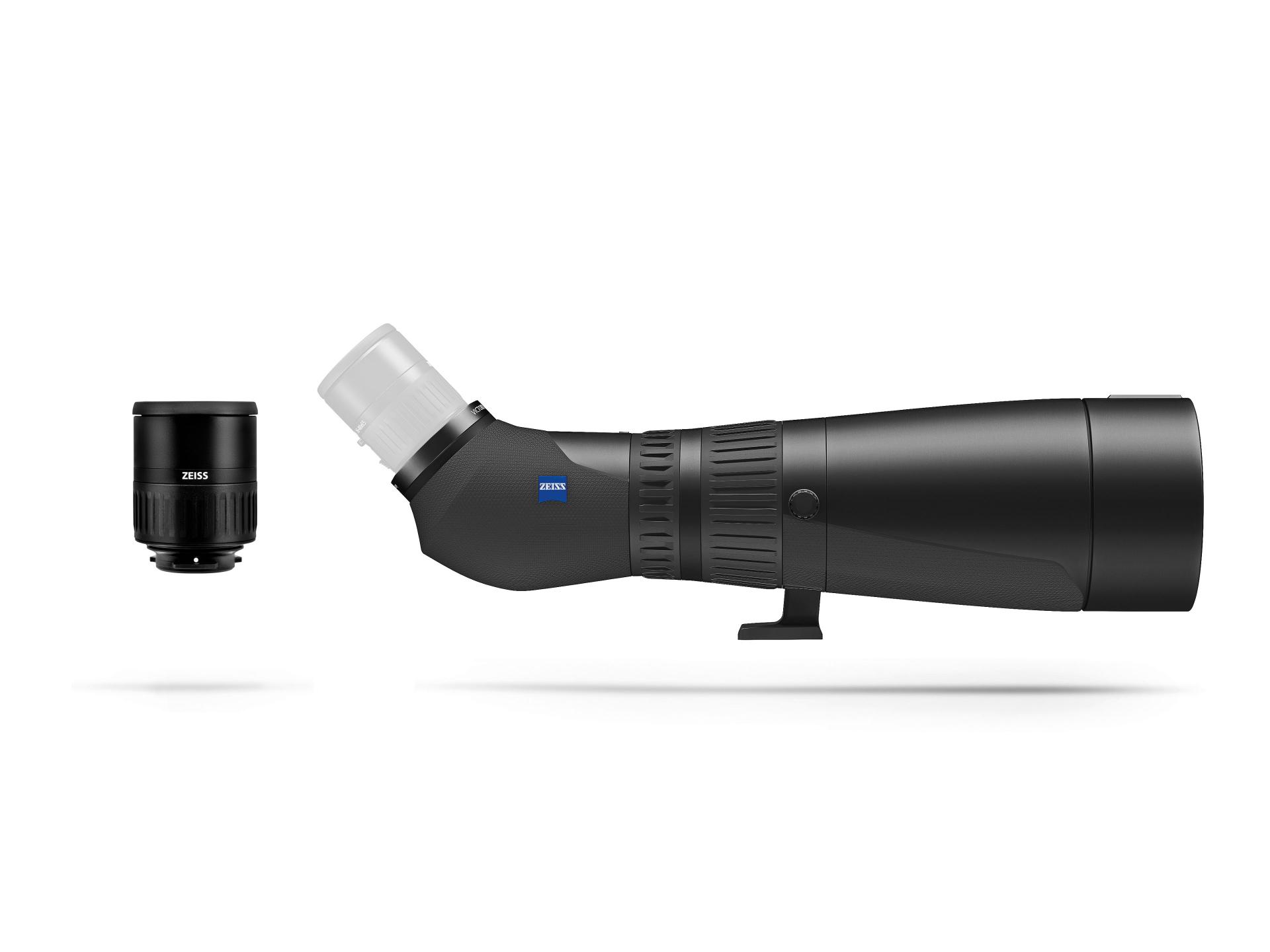 Black ZEISS spotting scope with a detachable eyepiece shown separated, displayed on a white background.