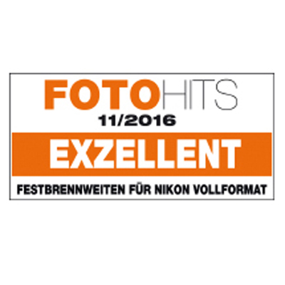 Award badge from FOTOHITS magazine, November 2016, rating ZEISS prime lenses for Nikon full-frame as “EXZELLENT.”