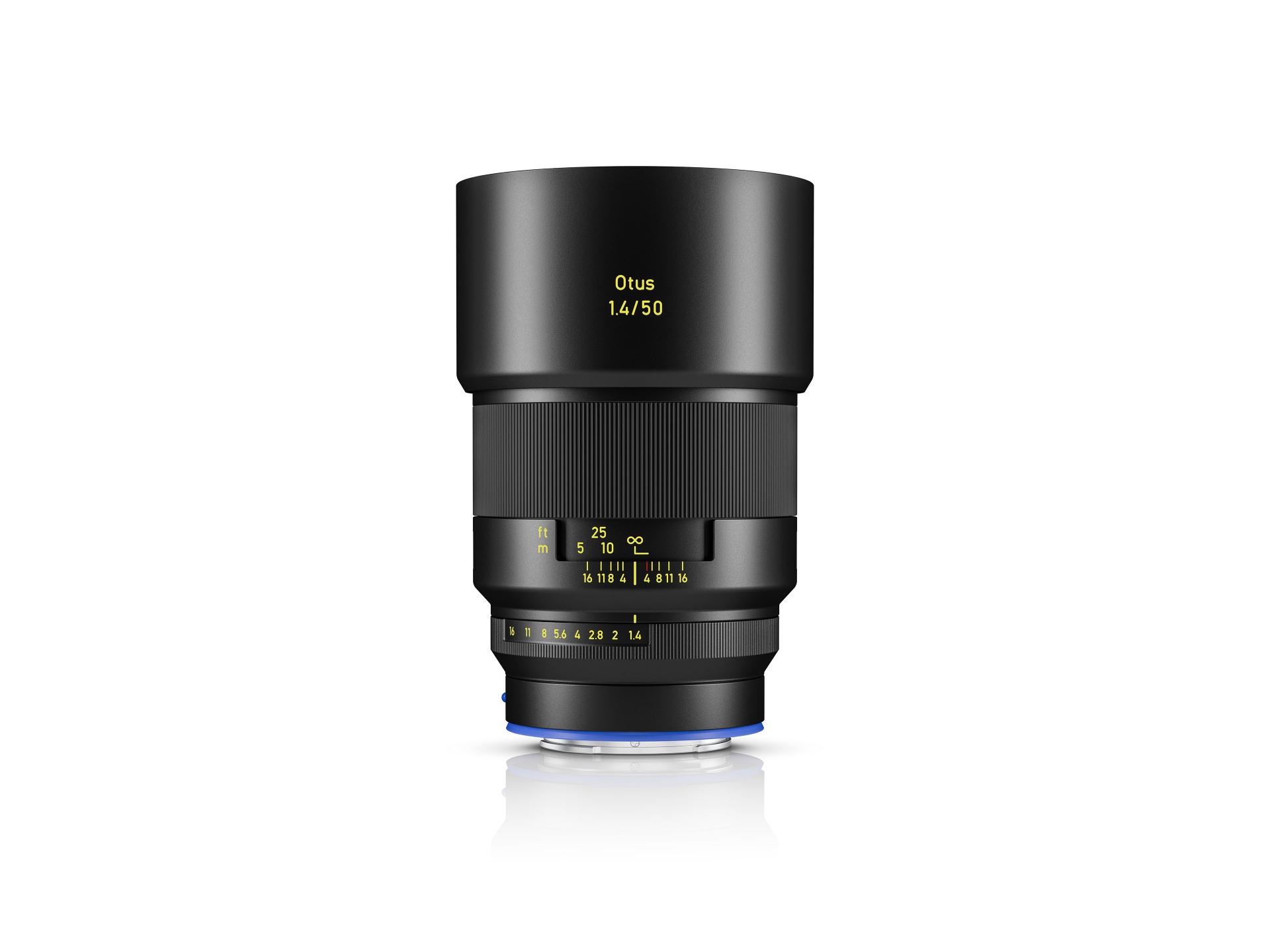 Black ZEISS camera lens with a textured focus ring, yellow and white markings, and a blue ZEISS logo on the barrel.