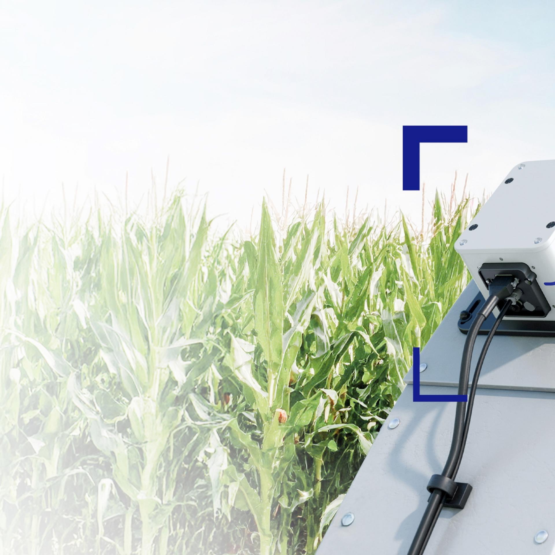 HALOS® montiert auf dem Auswurfkrümmer einer Landmaschine