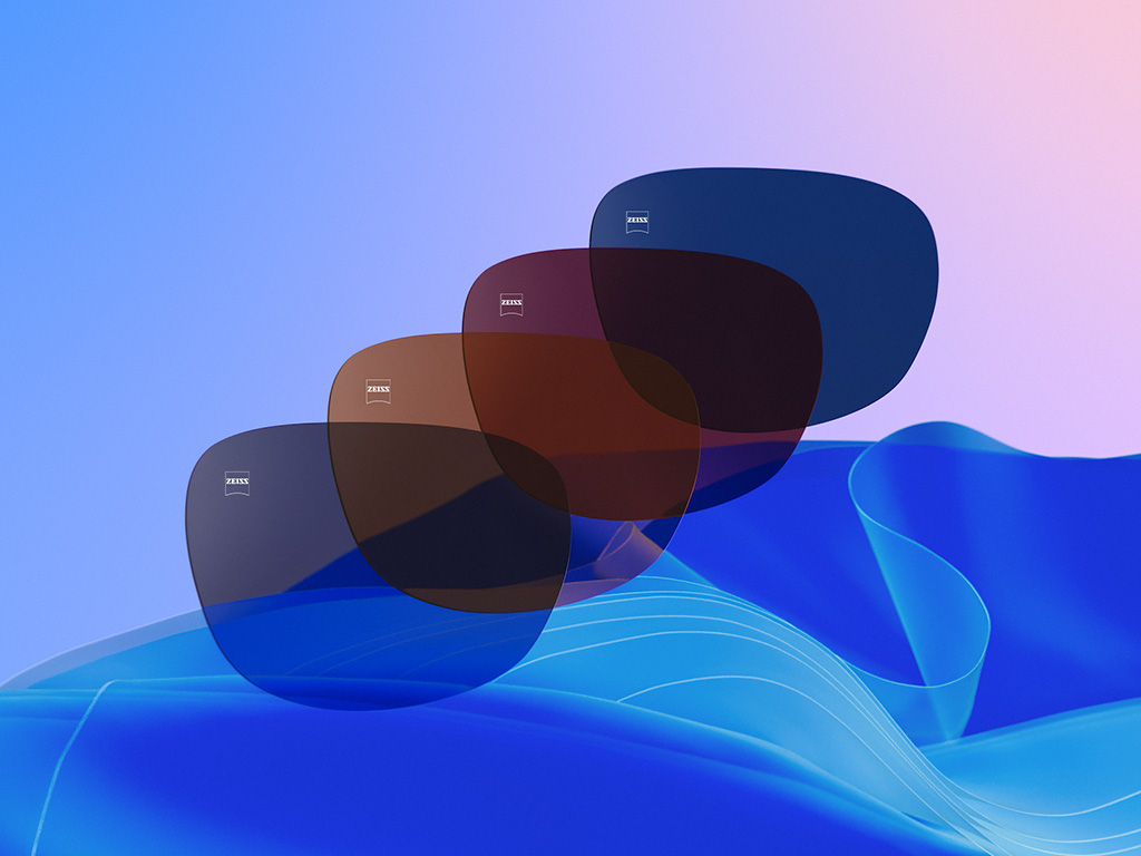 3D-CGI-Illustration von vier getönten Brillengläsern in Dusk Grey, Copper Brown, Burgundy und Midnight Blue.