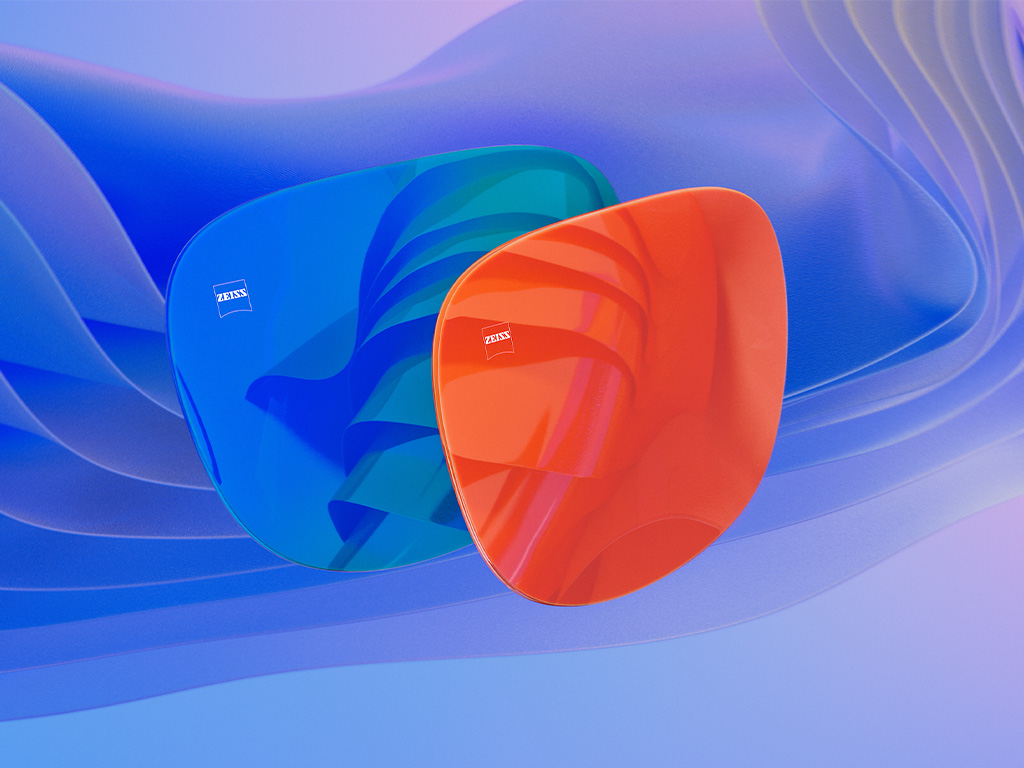 3D-CGI-Illustration von zwei Sonnenbrillengläsern mit blauer und oranger Mirror Beschichtung.