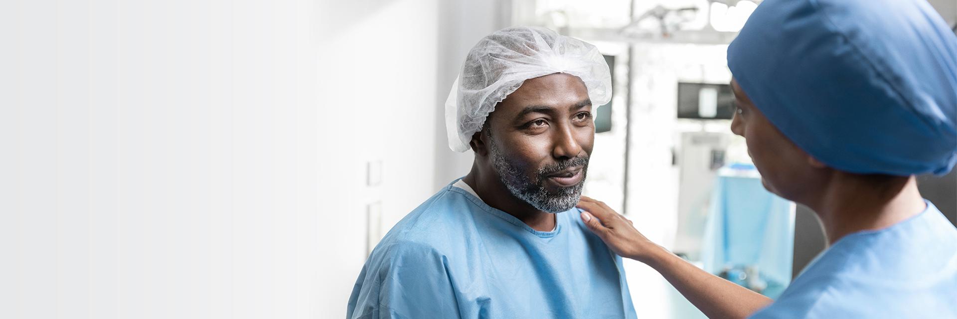 Patient and nurse before cataract surgery.