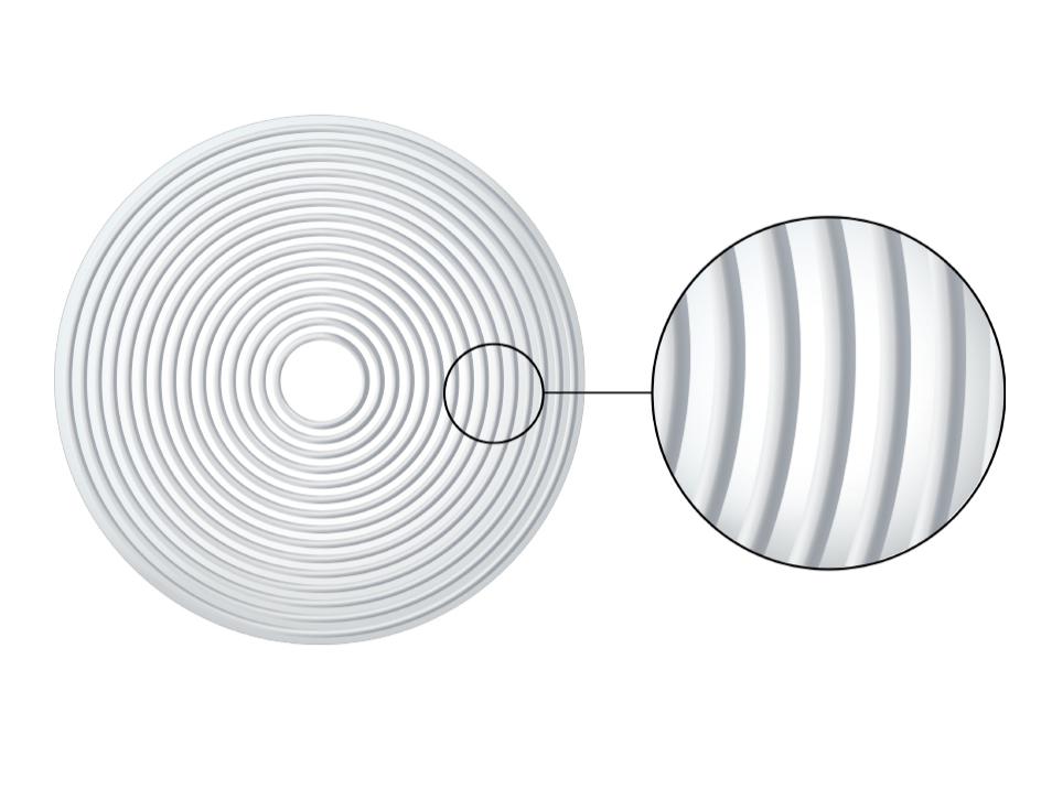 Abbildung eines ZEISS MyoCare Brillenglases mit C.A.R.E.®Elementen, die die Defokussierung auf der Netzhaut erzeugen, um das Fortschreiten der Kurzsichtigkeit zu verlangsamen.
