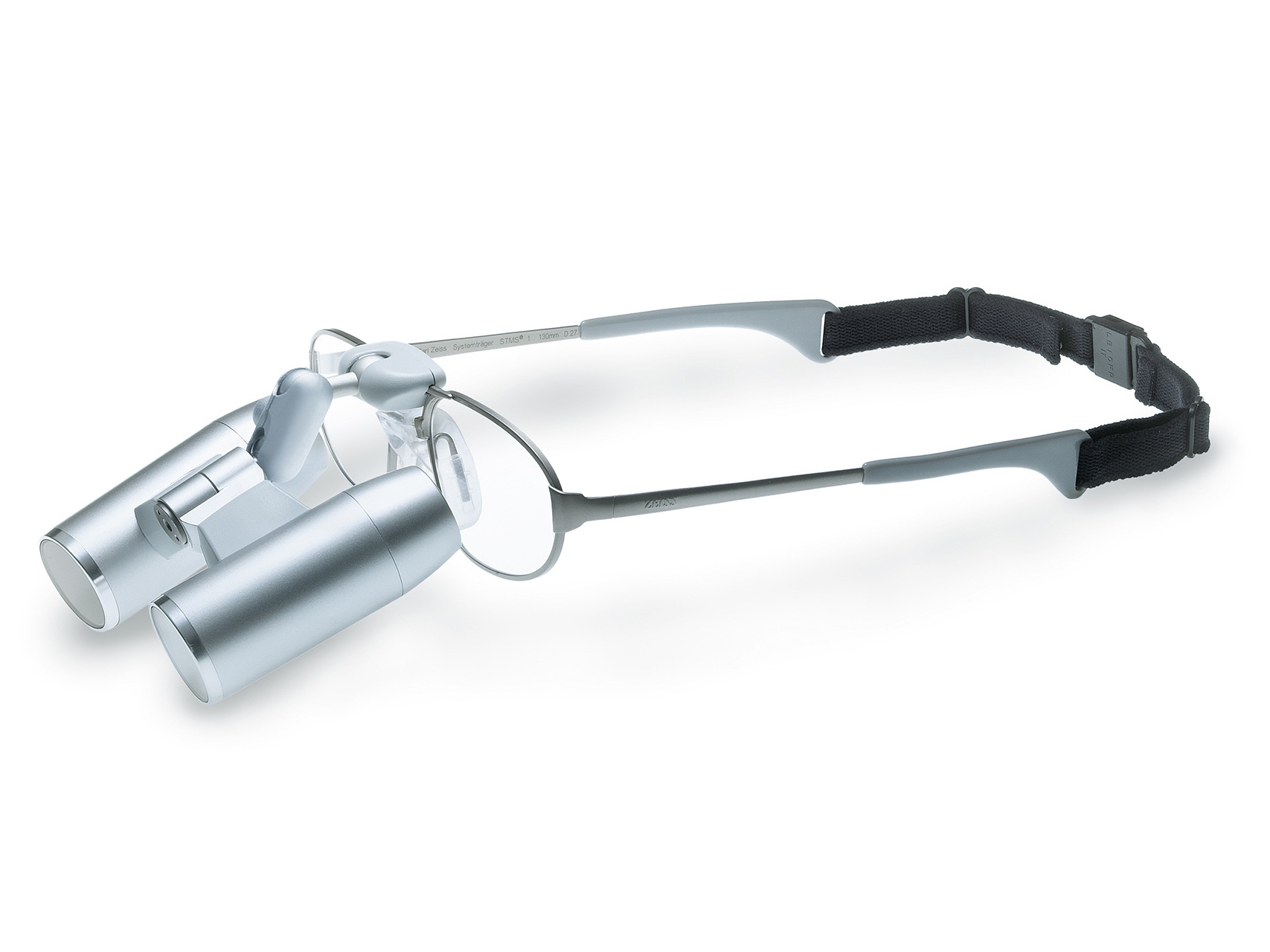 Brille mit einem Band und am Rahmen befestigter ZEISS Kopflupe.